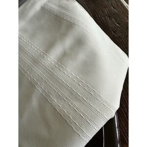 Large easy care polyester tablecloth 60" x 120" light cream with textured lines